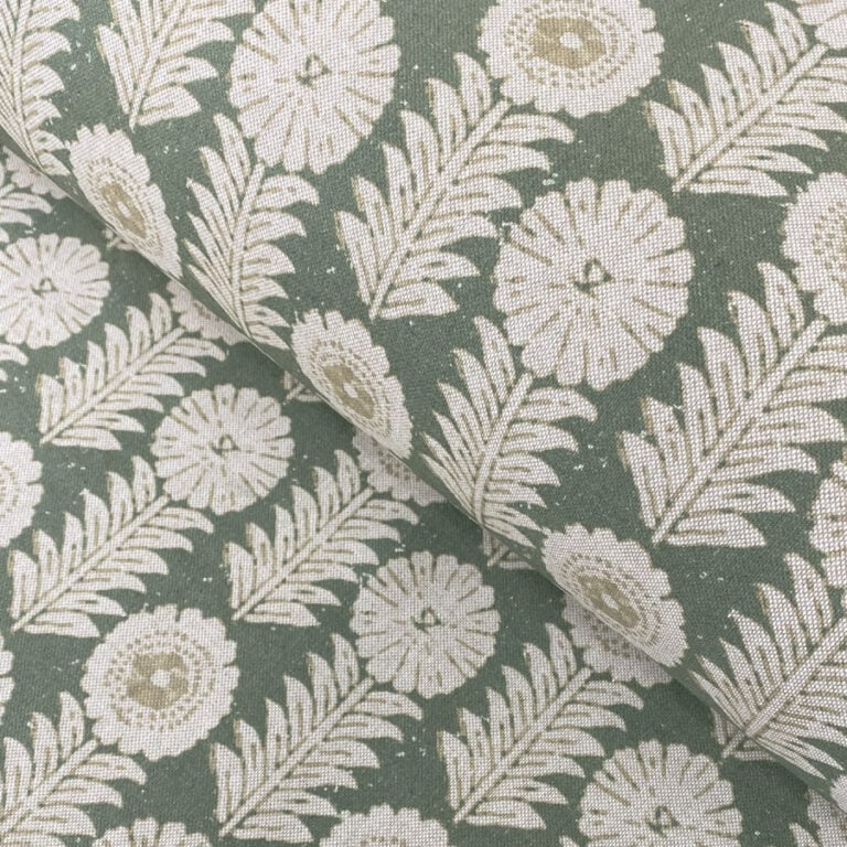 A folk-inspired block print style design with a stylised floral motif in green. A versatile mid scale design suitable for curtains and blinds.