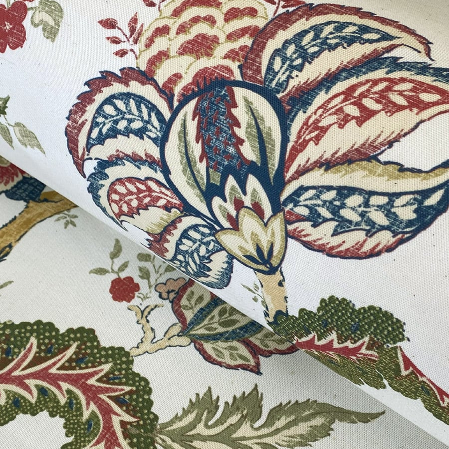 Large scale Tree of Life linen curtain fabric with stylised leaves and branches in greens and blues. Printed on 100% cotton, ideal for curtains and blinds.