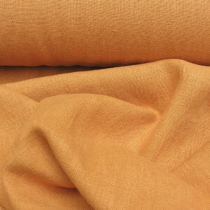 100% Linen fabric with a super soft drape in orange. This mid weight linen is suitable for curtains and blinds where a good drape is uppermost.