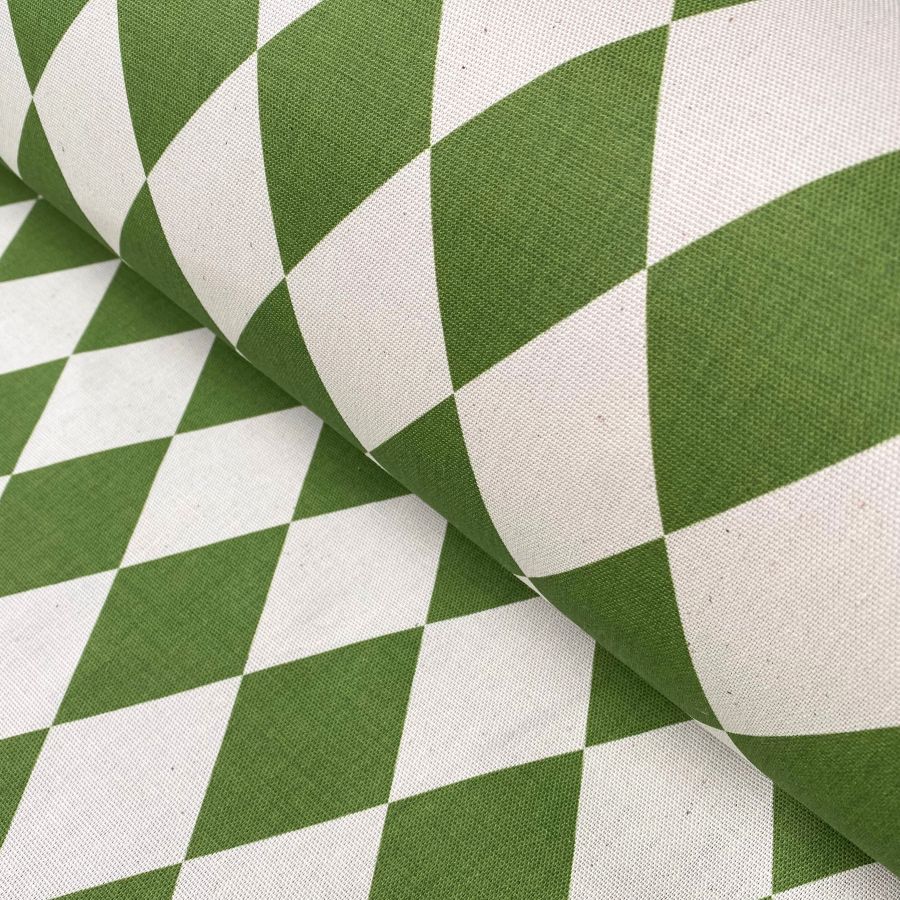Harlequin design fabric in green diamonds