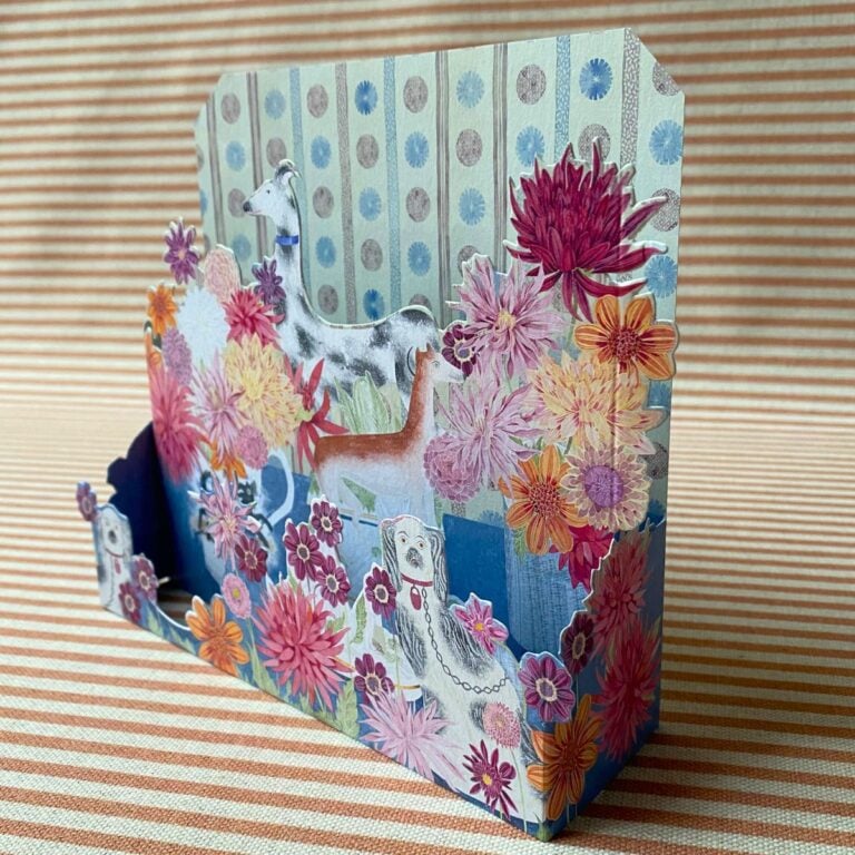 Angie Lewin 3D card with multicoloured flowers and dogs