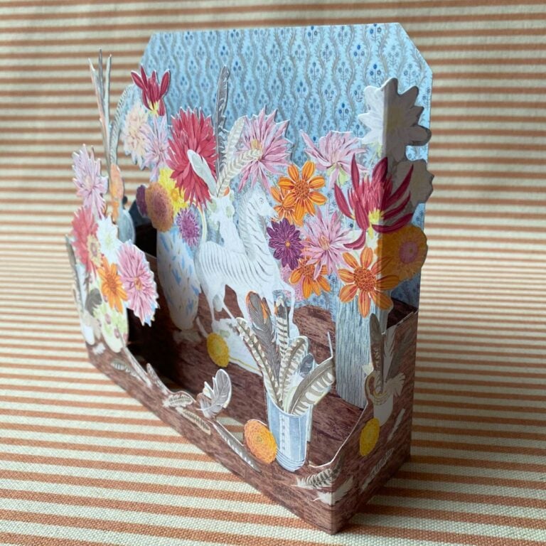 Angie Lewin 3D card with multicoloured flowers and a zebra