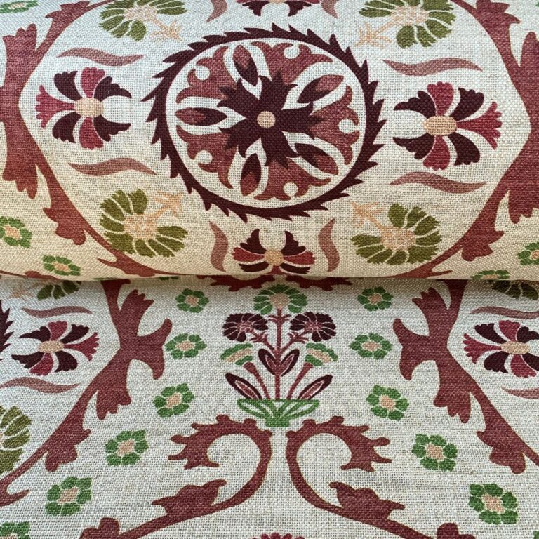 Tinsmiths Extra Wide Suzani print cloth on a roll in Henna Brown & Olive Green