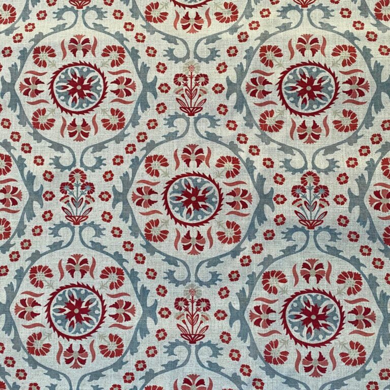 Tinsmiths Extra Wide Suzani print cloth on a roll in Strawberry & Duckegg