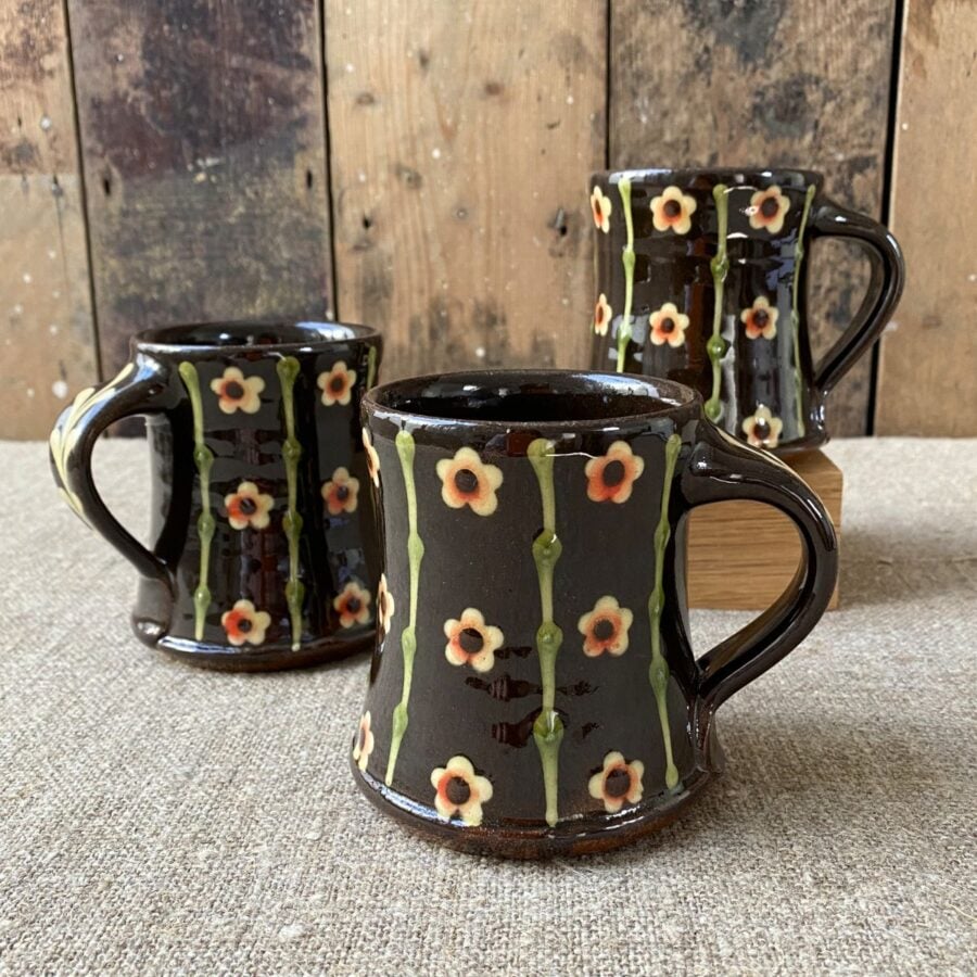 Trio of Paul Young Blossom-sprigged black Mugs