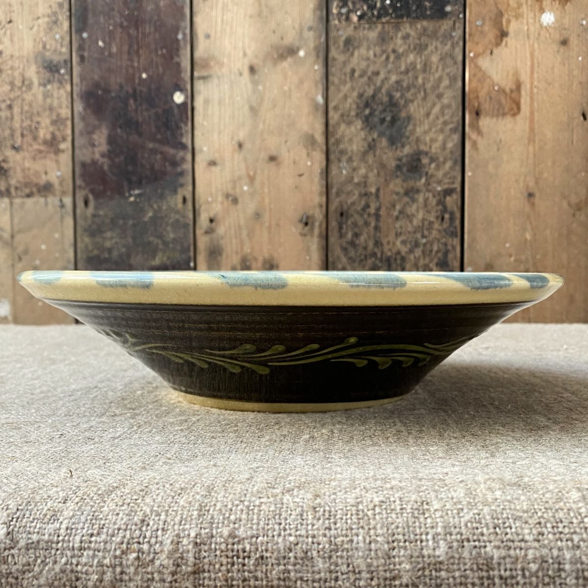Highly detailed, ceramic slipware daisy bowl by Paul Young