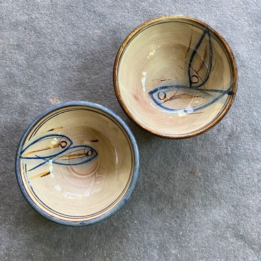 Slipware bowl taken from above on a stone floor