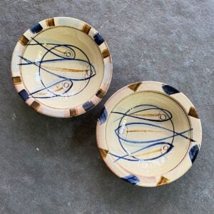 Jennifer Hall Slipware pasta bowls from above on a stone background