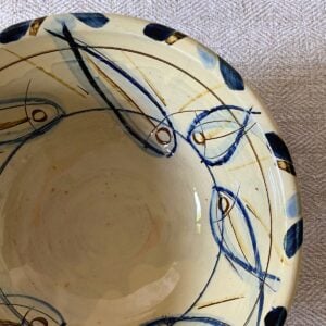Jennifer Hall Slipware Salad Bowl overview on cream textile backcloth