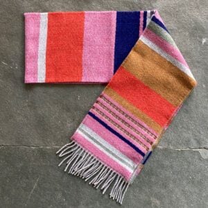Wallace + Sewell Striped Scarf on a stone floor