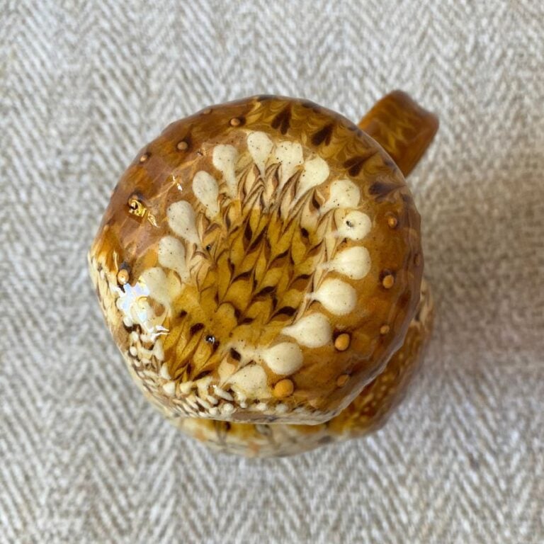 Pottery jug in shape of an ow, with a removable head