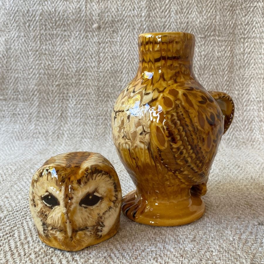 Pottery jug in shape of an ow, with a removable head