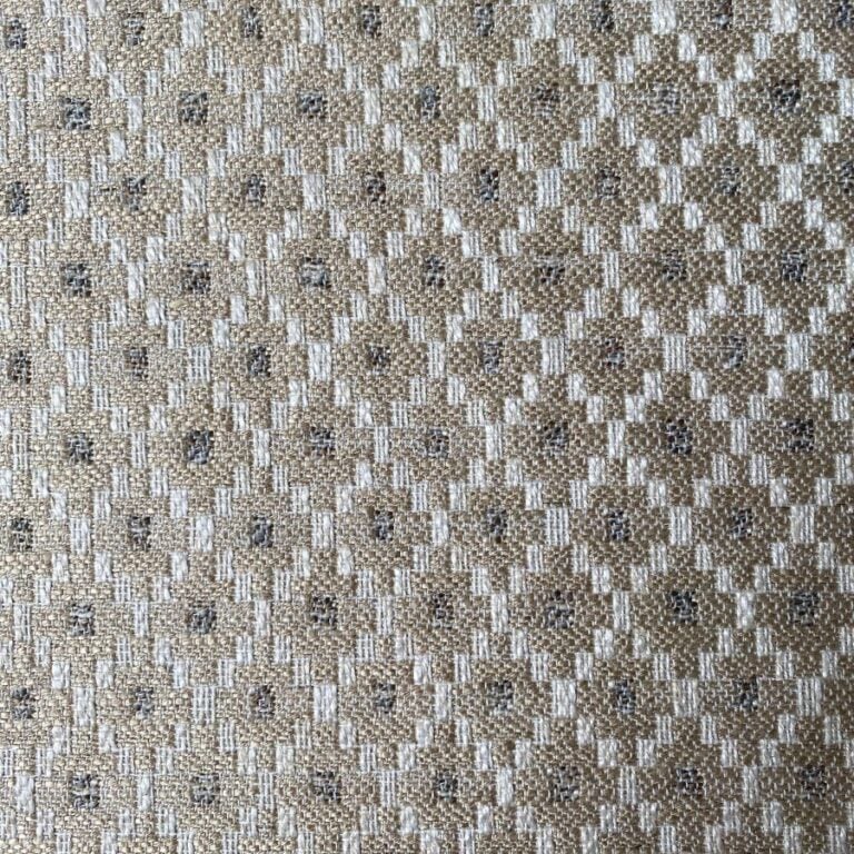 Cream, diamond patterned upholstery fabric