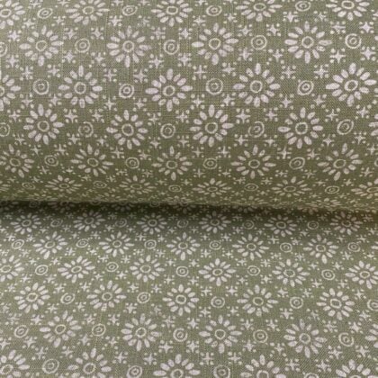 Fabric roll with green, small scale daisy pattern