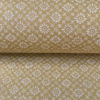 Fabric roll with mustard yellow, small scale daisy pattern