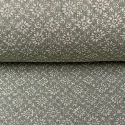 Roll of fabric with a sage green floral design