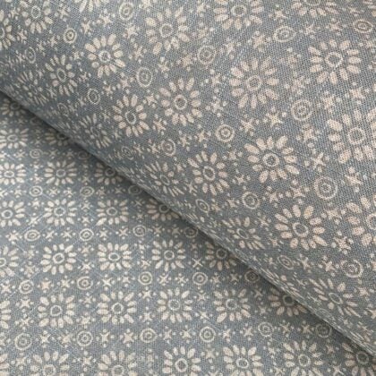 Fabric roll with sea blue, small scale daisy pattern