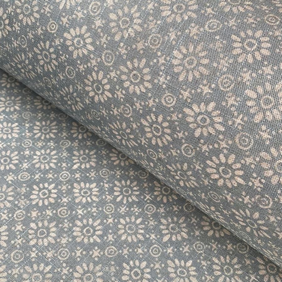 Fabric roll with sea blue, small scale daisy pattern