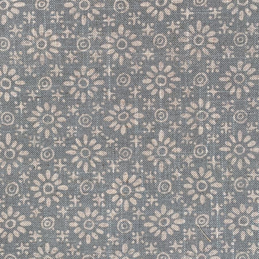 Fabric roll with sea blue, small scale daisy pattern
